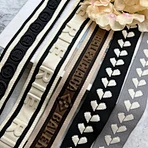 Skin-friendly 100% polyester 3D embossed knit tape webbing, designed for enhancing pants side strips and other clothing accessories.